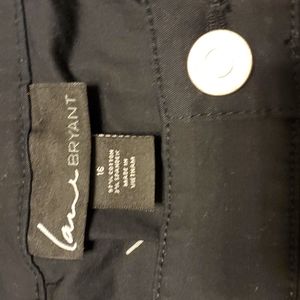 Lane Bryant Black leggings paisley front,solid Pointe knit fabric in back.